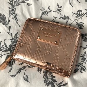 Michael Kors metallic rose gold wallet